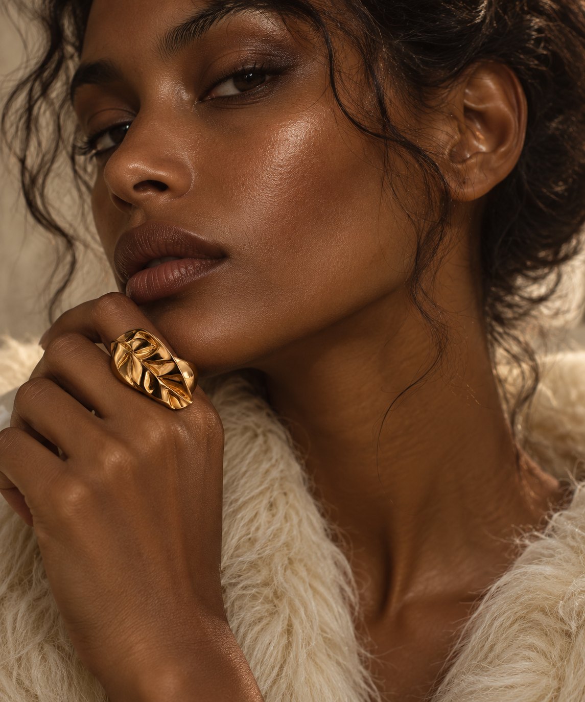 Model wearing the W.Ritzdorf sculptural gold leaf ring in an editorial jewellery campaign